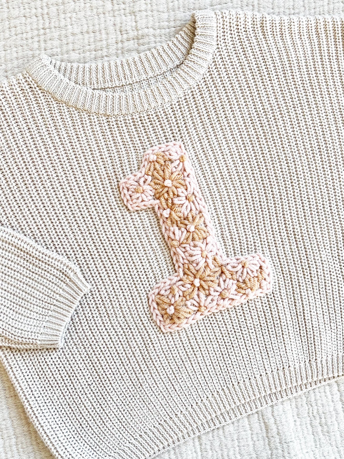 "1" EMBROIDERED SWEATER